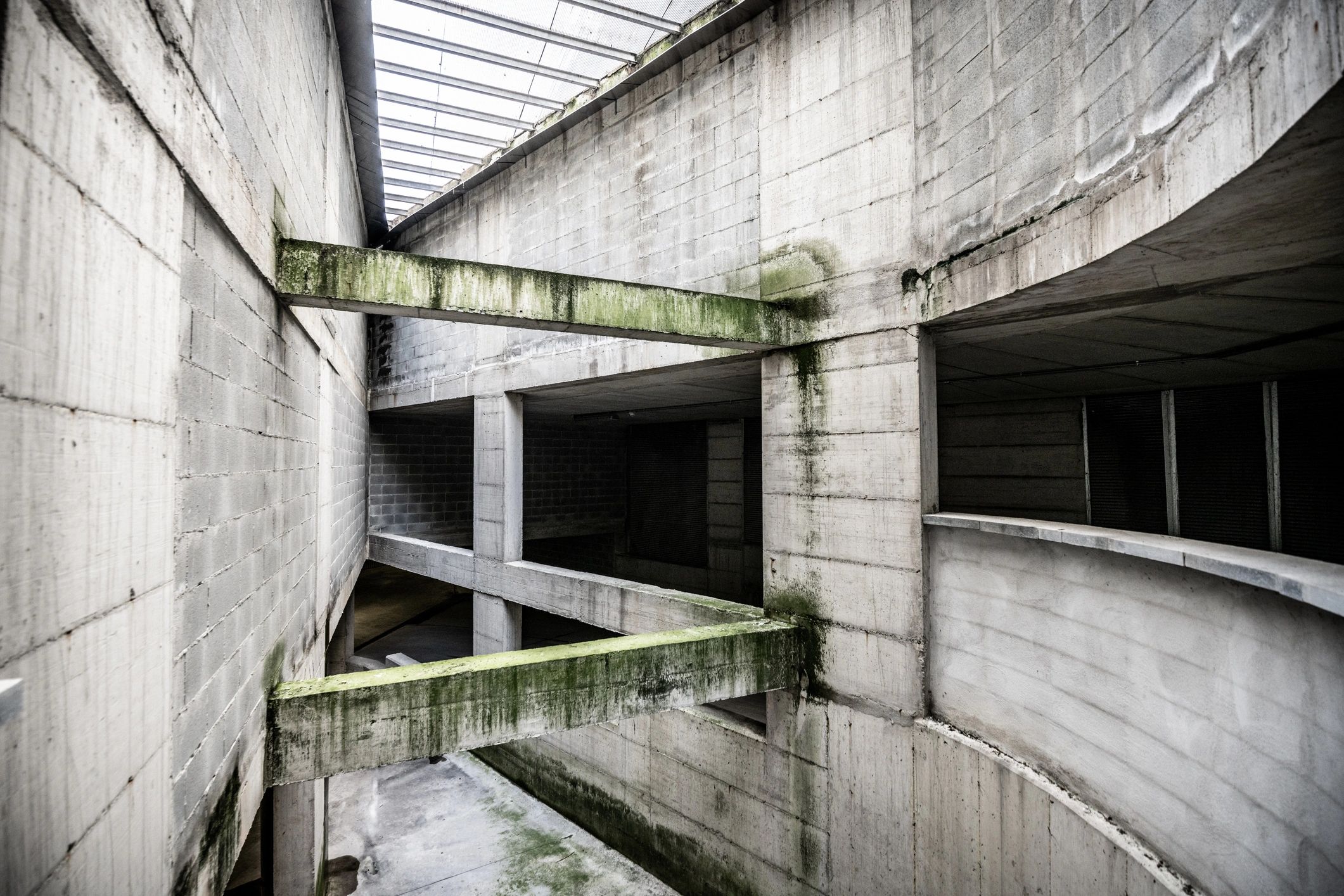Modern concrete architectural exterior with monolithic bunker-like form