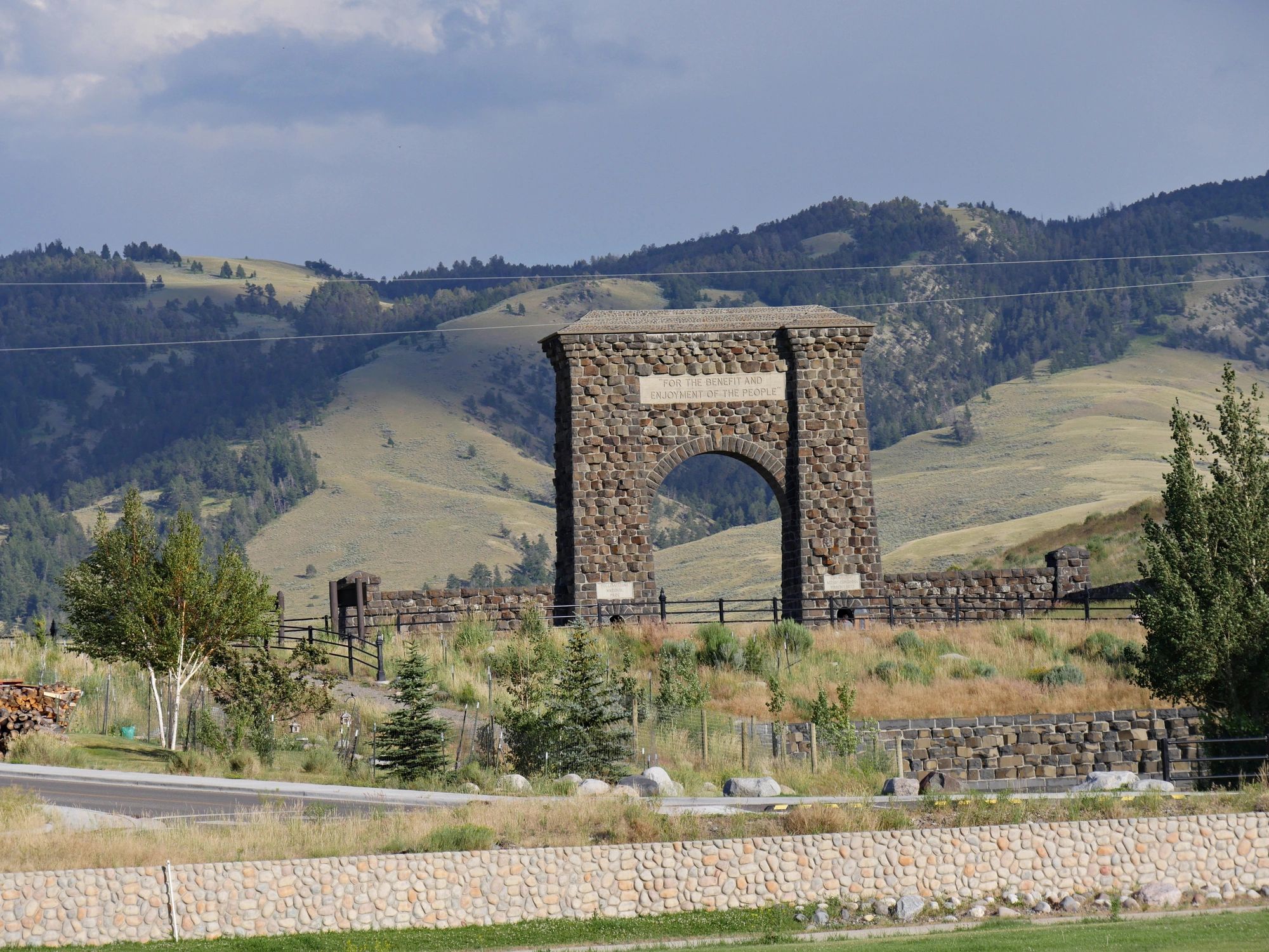 Stone arch and mountain setting at Gardiner, Montana