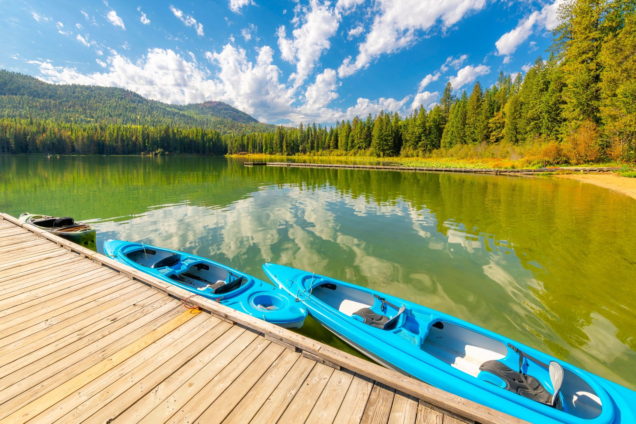 Dock and kayaks along Cocolalla Lake in northern Idaho