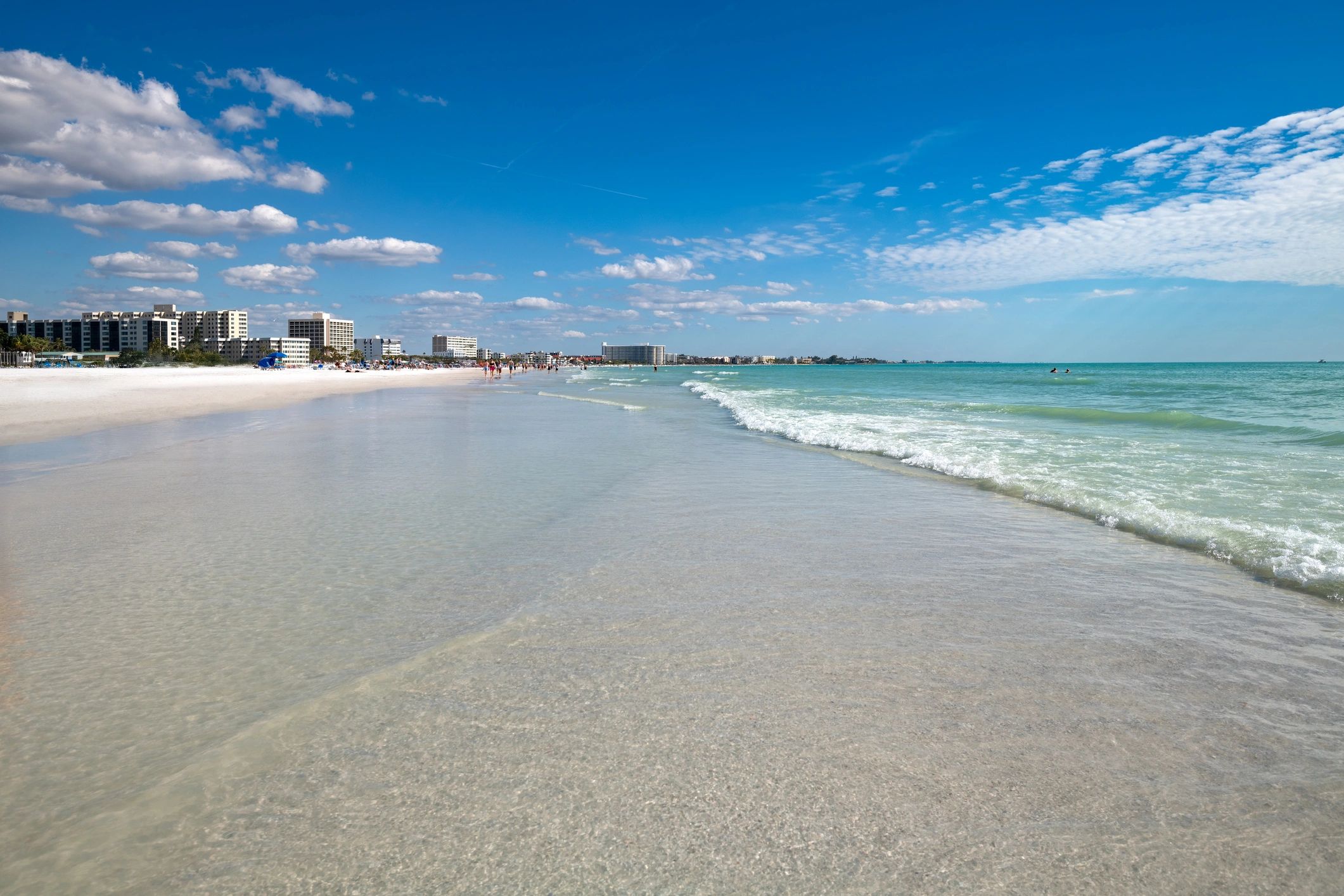 A stunning view of Siesta Key beach in Sarasota, Florida, famous for its pure white sands.