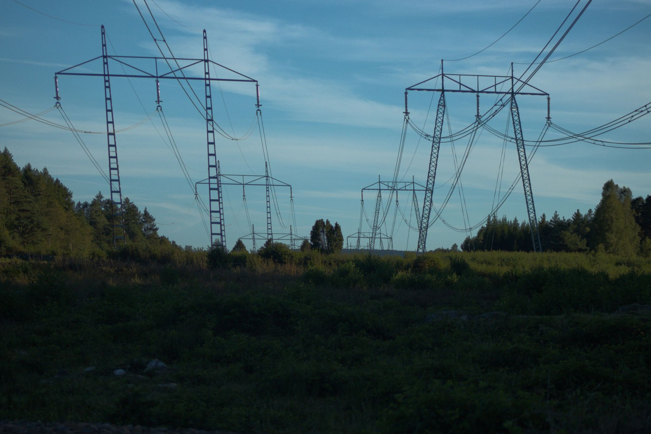 Transmission towers showing vulnerable infrastructure relevant to EMP preparedness