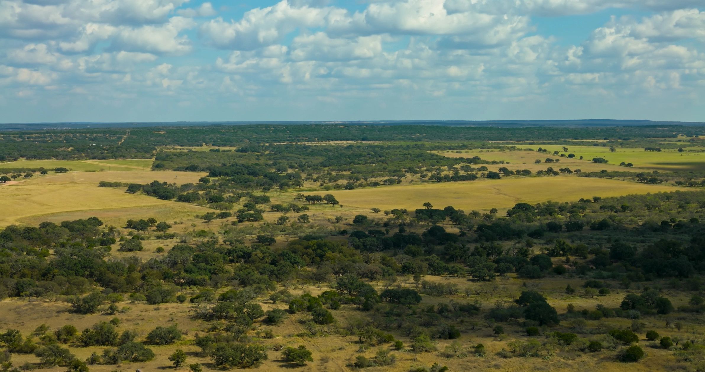 Aerial View of Rolling Hills and Farmland in McCulloch County, Texas